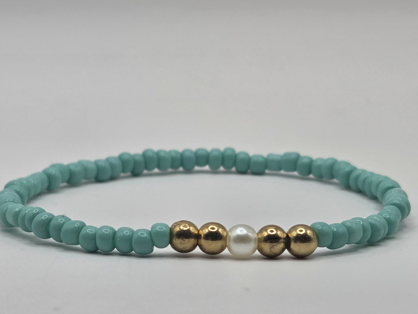 handmade bracelet in light blue and white