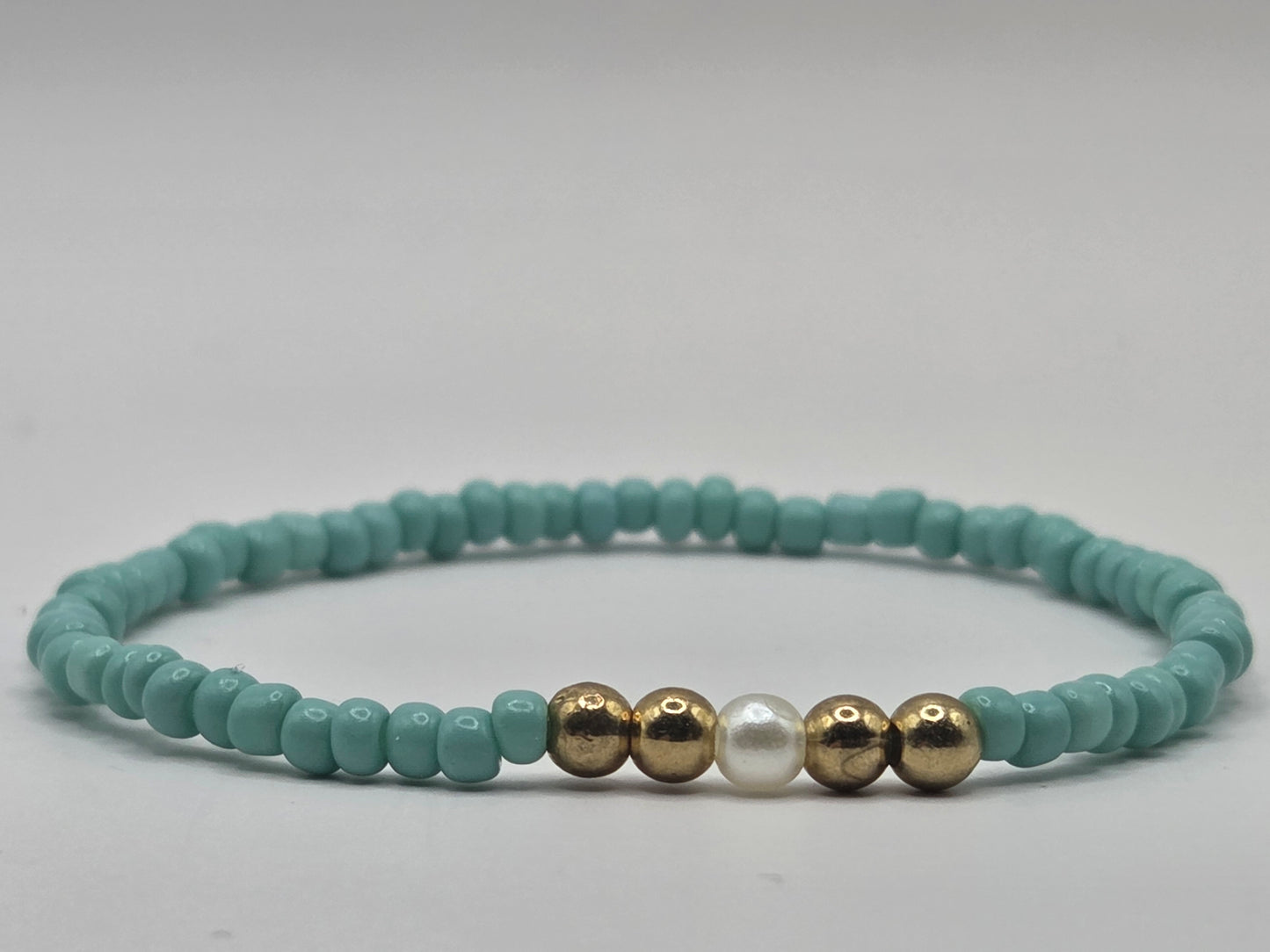 handmade bracelet in light blue and white