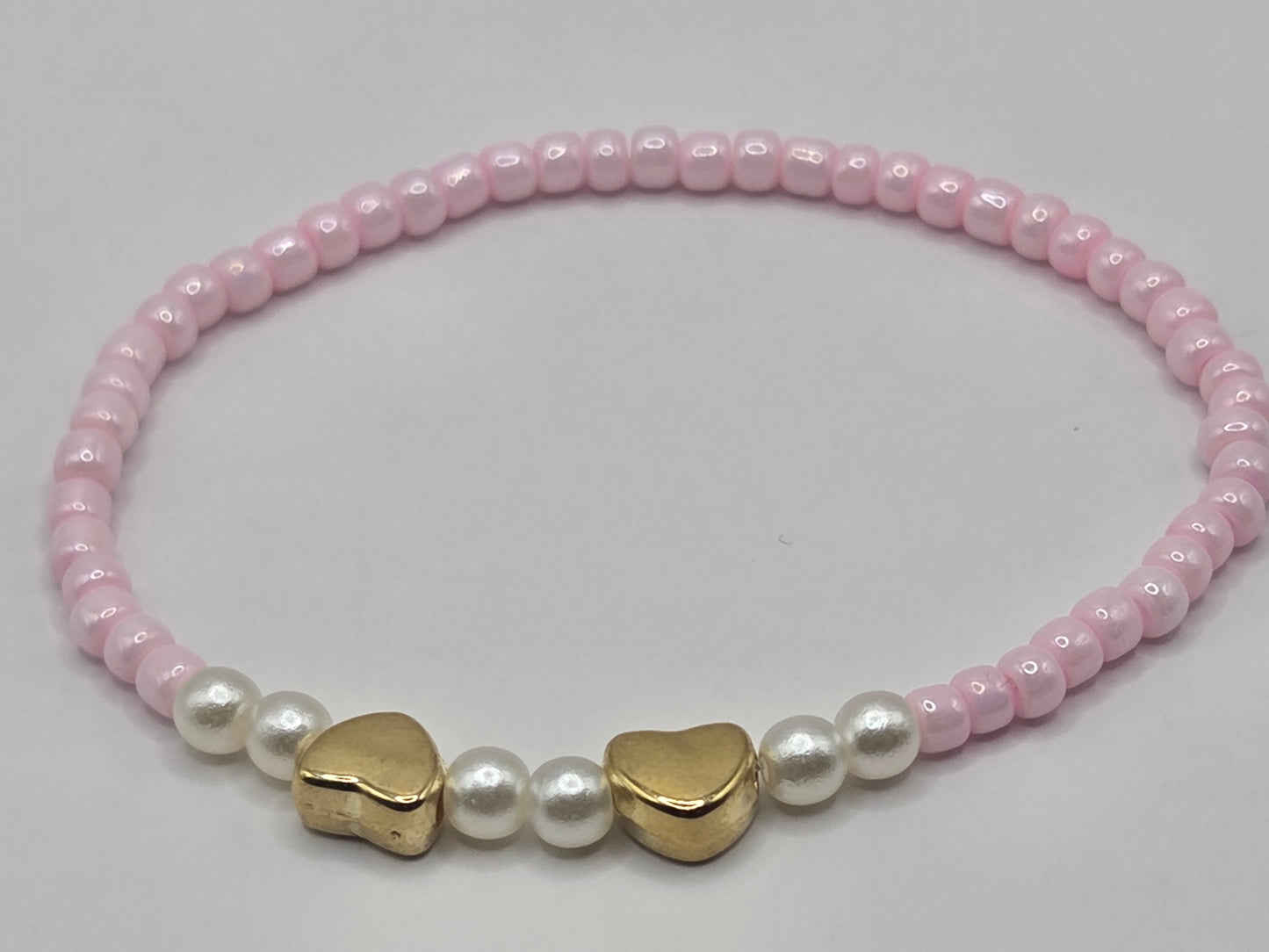 Delicate & full of love – handmade bracelet in pink with heart details