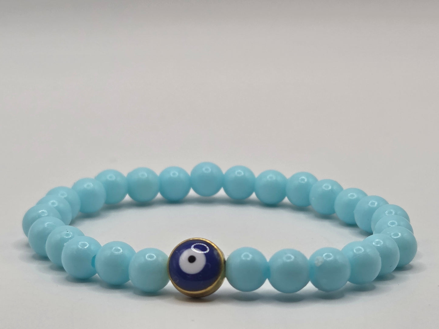 Light blue bracelet with Evil Eye – lightness & protection in soft tones