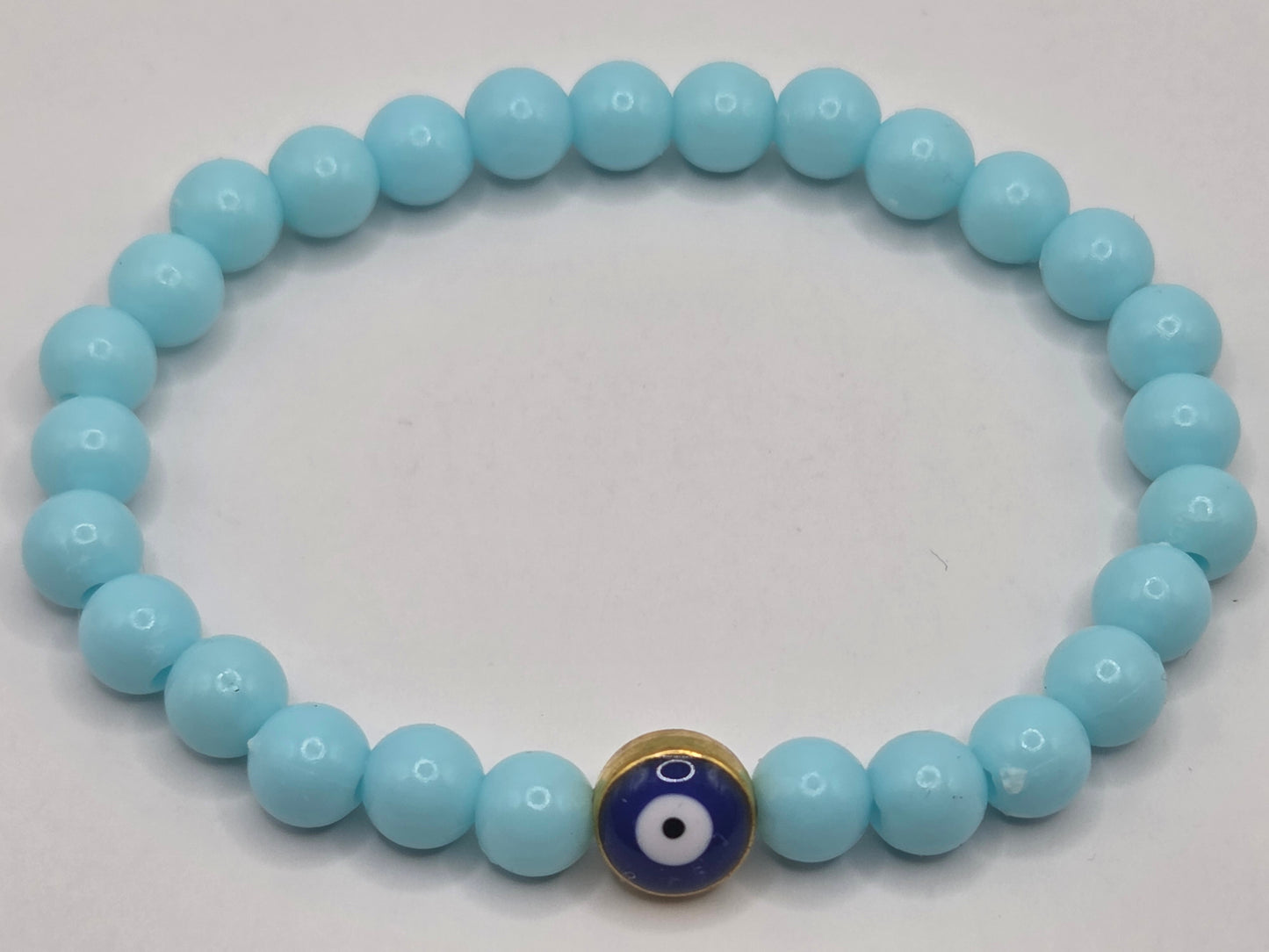 Light blue bracelet with Evil Eye – lightness & protection in soft tones
