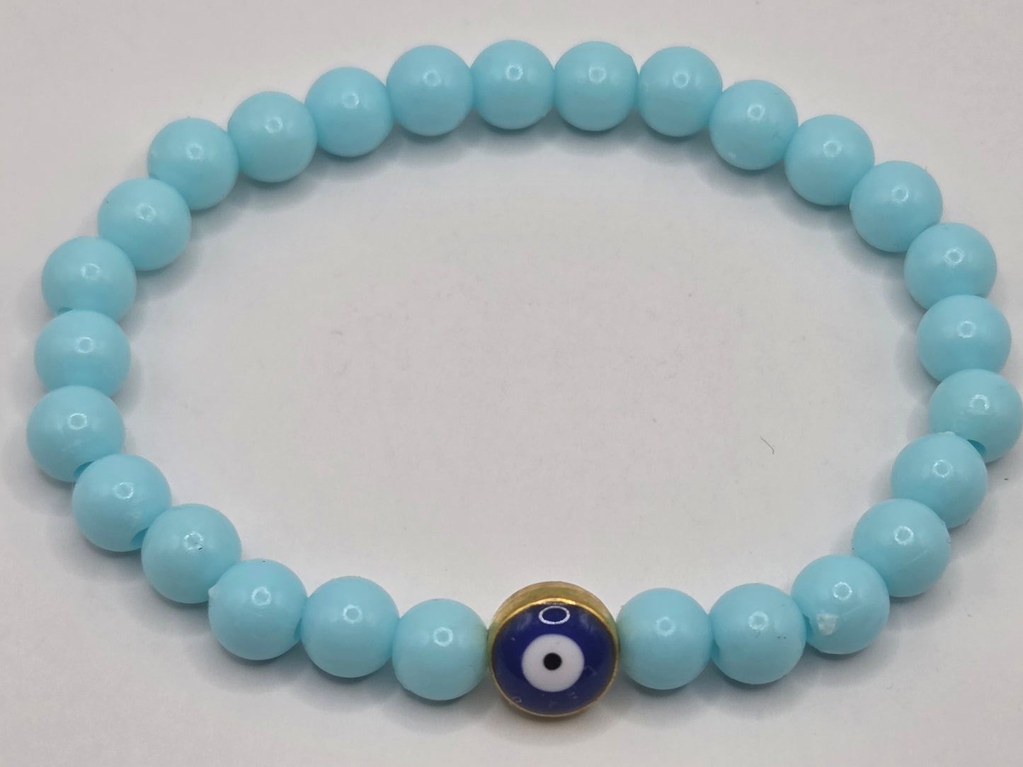 Light blue bracelet with Evil Eye – lightness & protection in soft tones