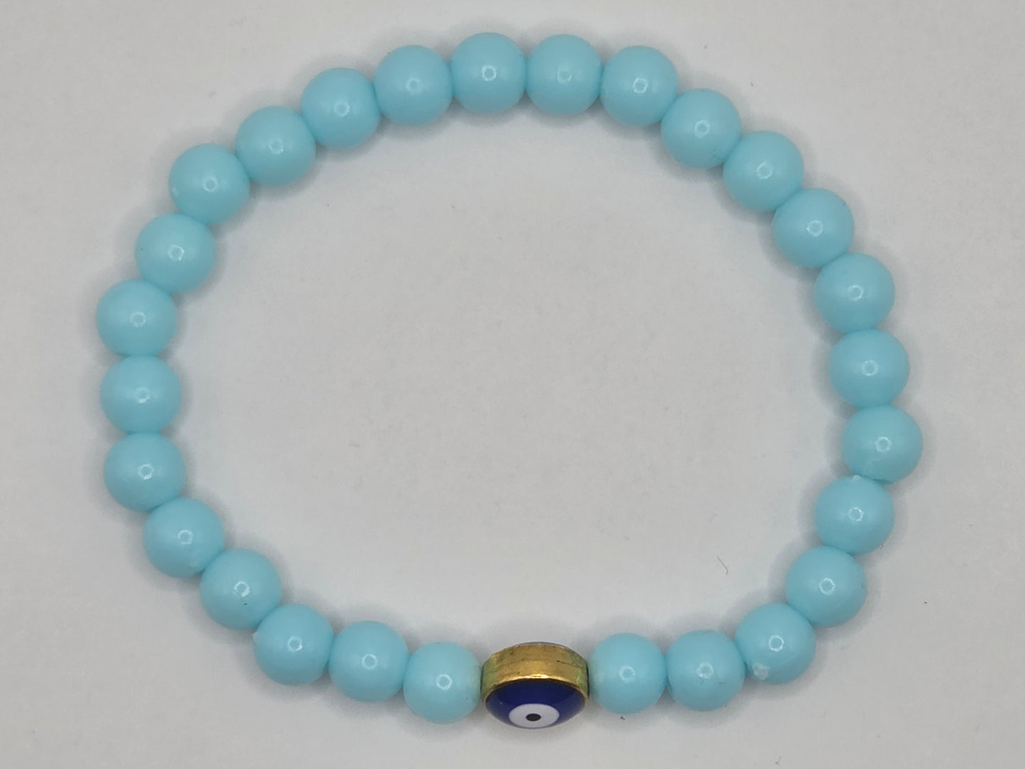 Light blue bracelet with Evil Eye – lightness & protection in soft tones