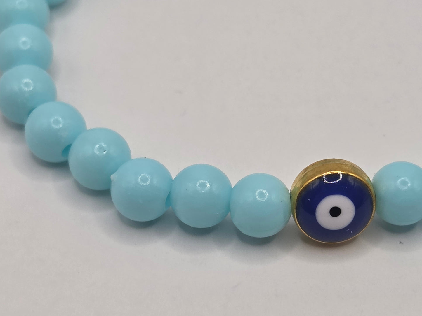 Light blue bracelet with Evil Eye – lightness & protection in soft tones