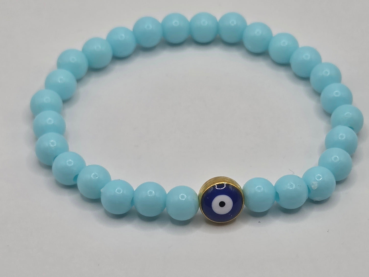 Light blue bracelet with Evil Eye – lightness & protection in soft tones