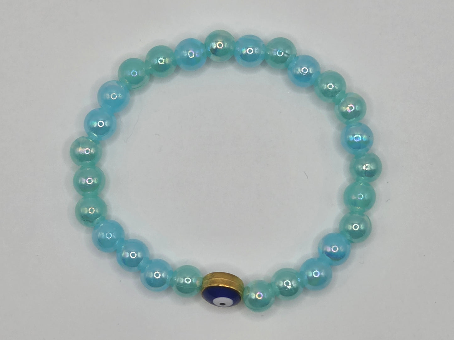 Shiny light blue bracelet with Evil Eye