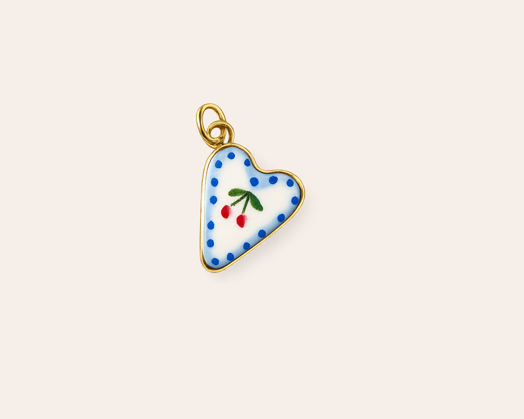 Heart charm with cherry motif
