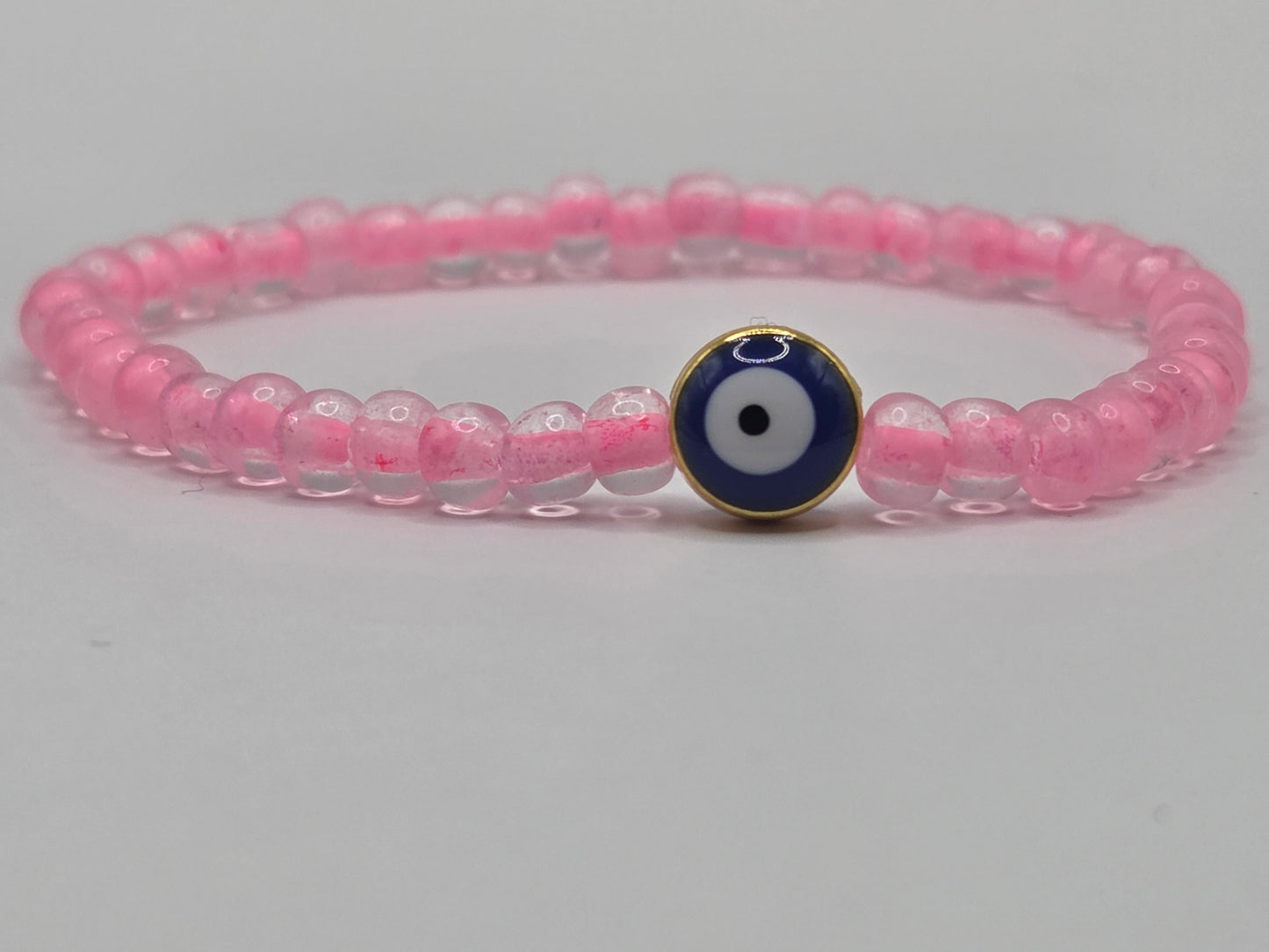 Handgemachtes Armband in Pink mit Evil Eye – Schutzarmband & personalisierbarer Schmuck für jeden Anlass