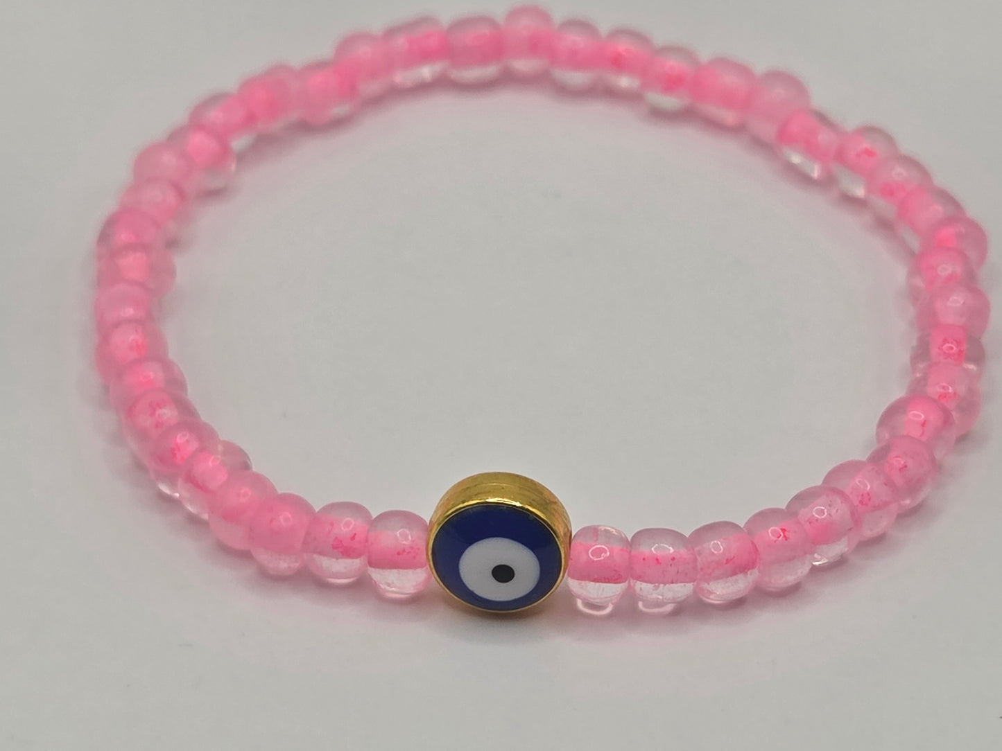 Handgemachtes Armband in Pink mit Evil Eye – Schutzarmband & personalisierbarer Schmuck für jeden Anlass