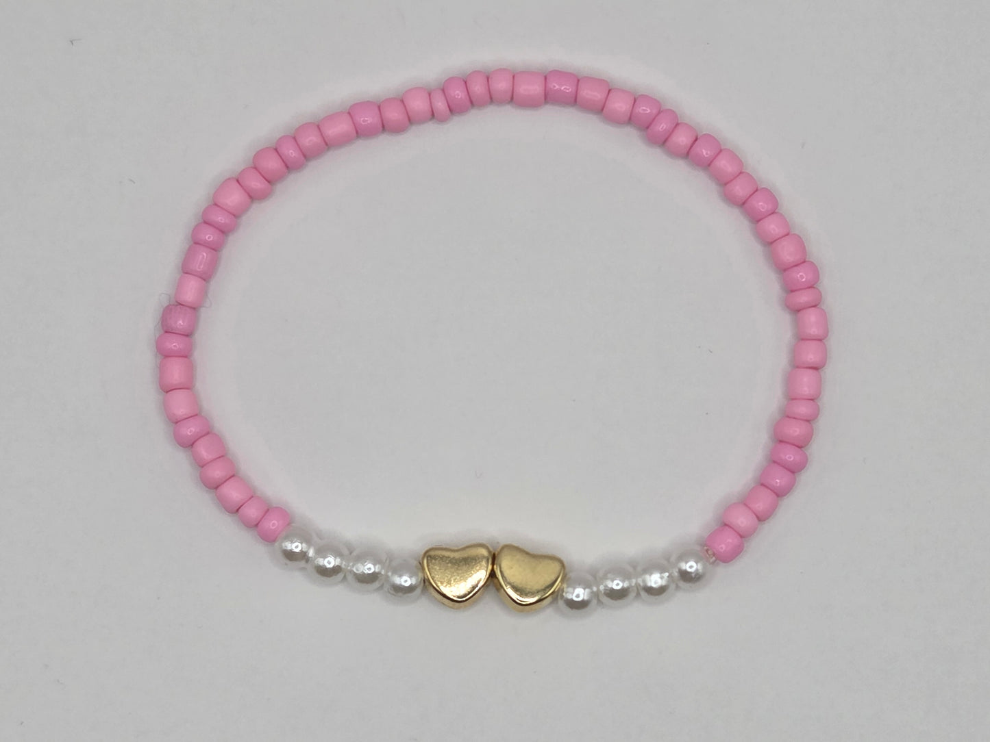Handmade pink bracelet with heart – loving, customizable jewelry