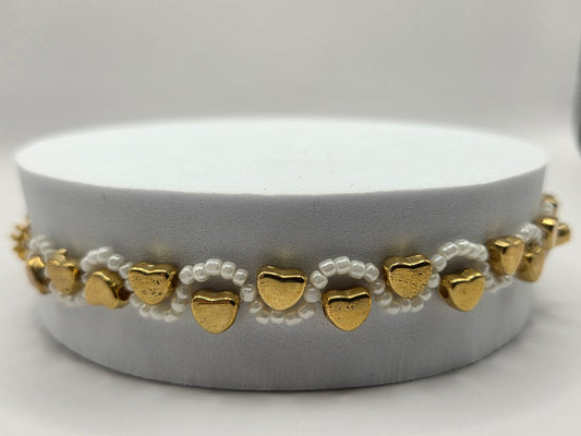 Handmade white bracelet with hearts