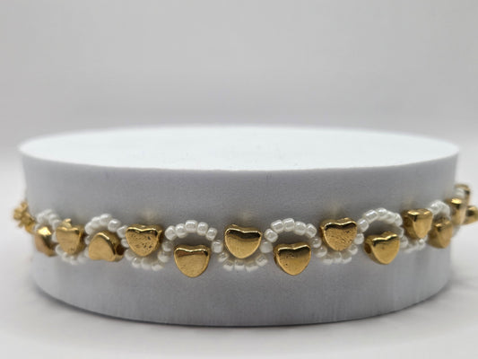 Handmade white bracelet with hearts