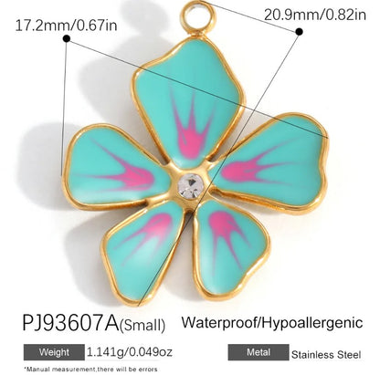 Gold-tone flower charm with gemstone