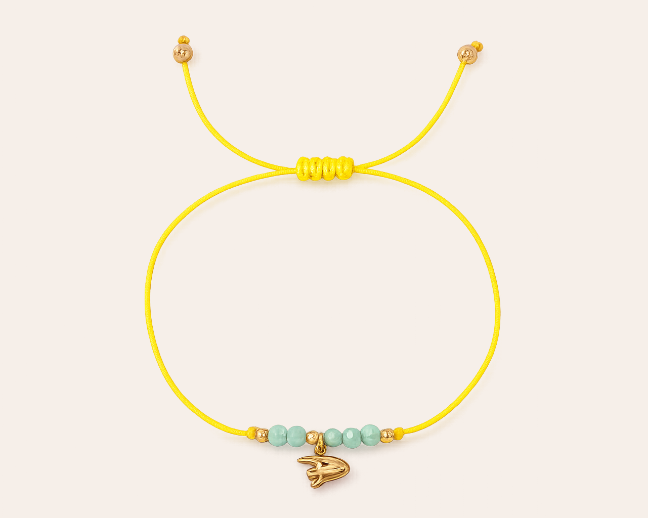 Yellow cord bracelet with angelfish charm