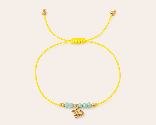Yellow cord bracelet with angelfish charm
