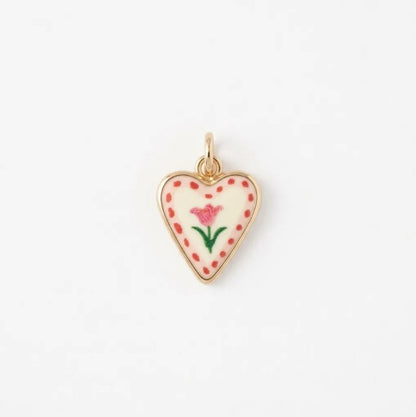 Heart-shaped charm with pink tulip