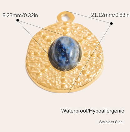 Charm with blue stone