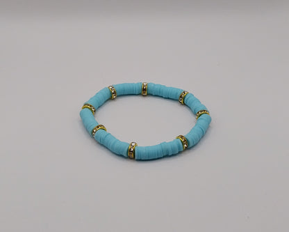 🌊 Handgemachtes Armband – Türkis mit goldfarbenen Details 🌊