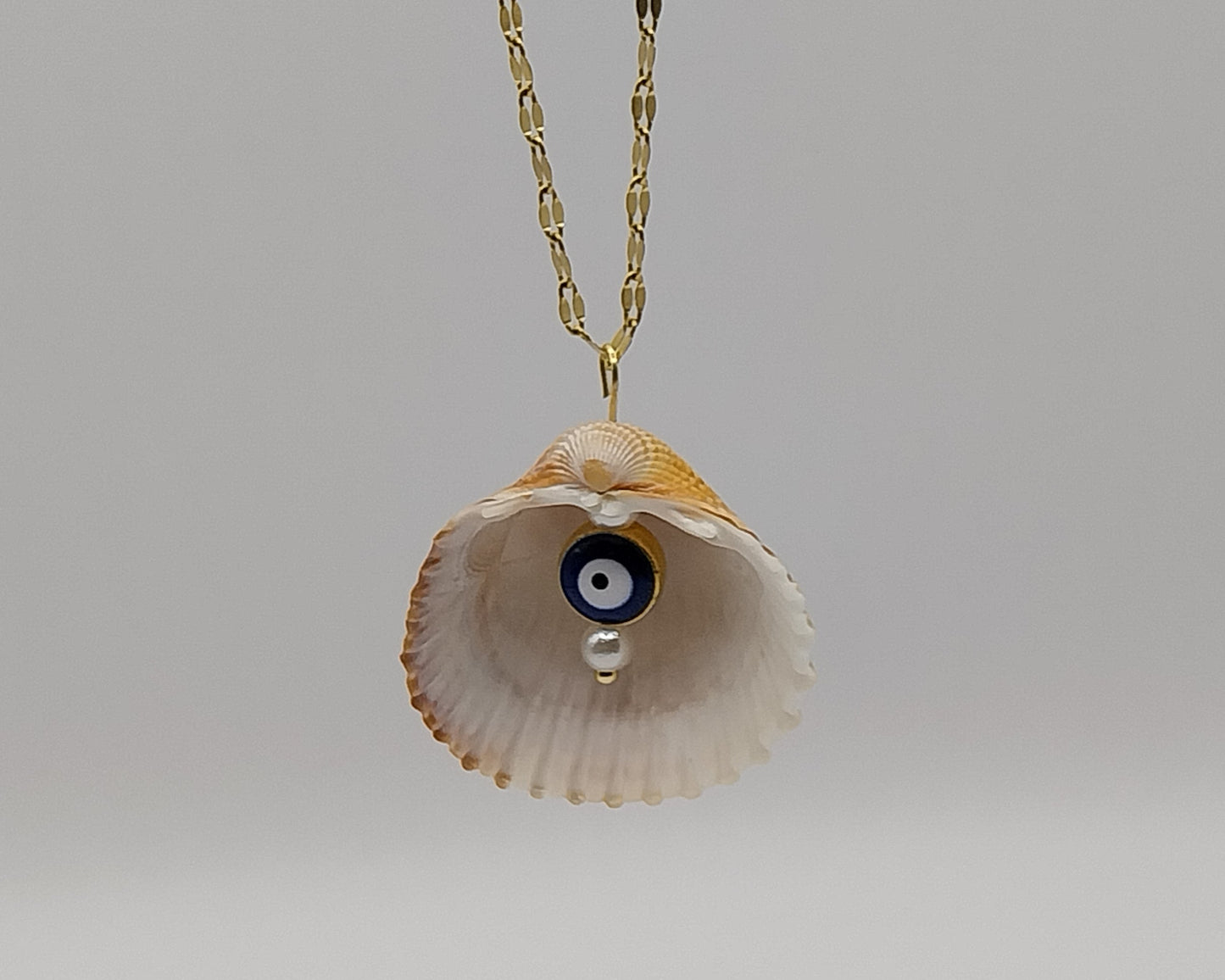 Muschel-Halskette mit Nazar-Anhänger – handgemacht & schützend