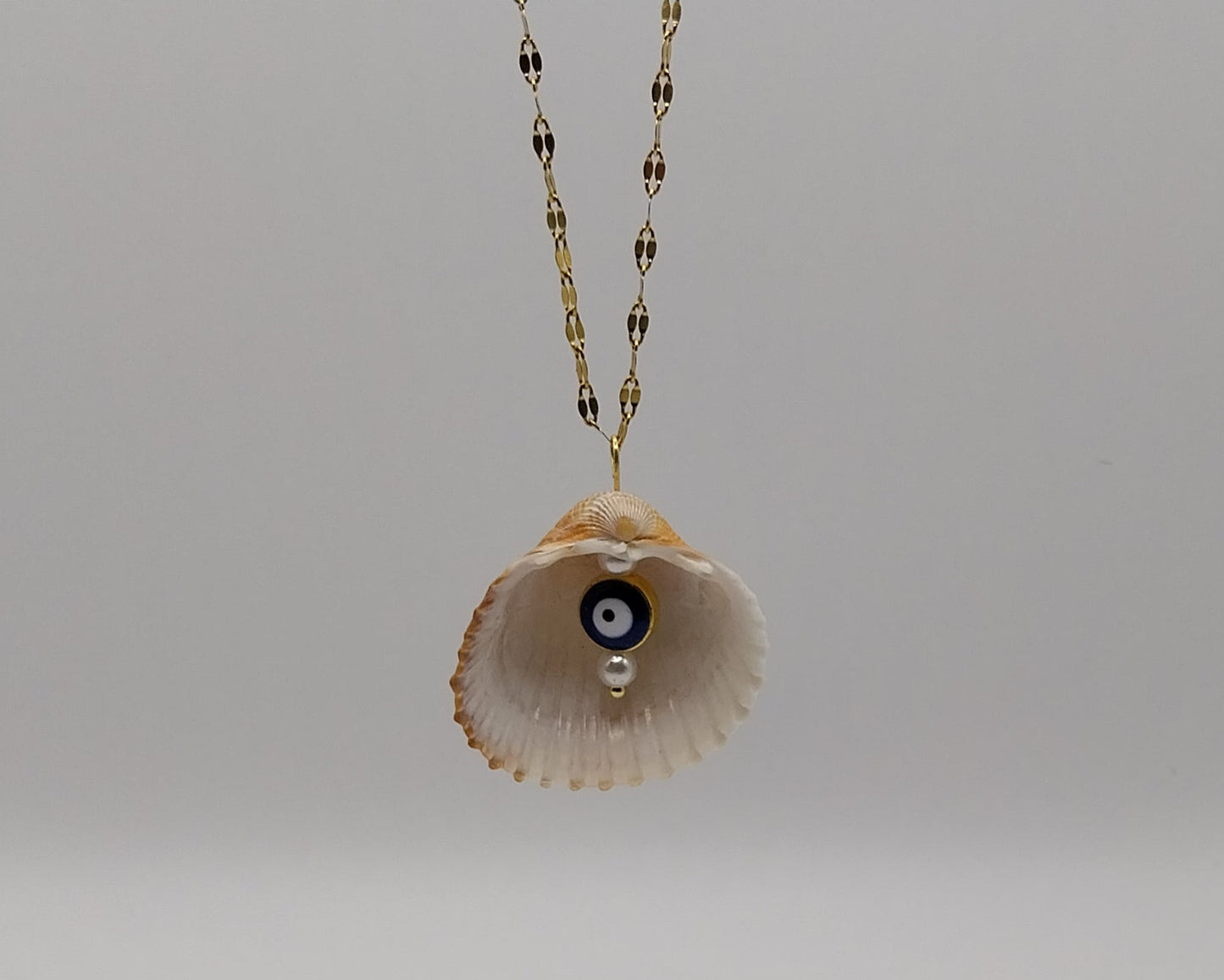 Muschel-Halskette mit Nazar-Anhänger – handgemacht & schützend