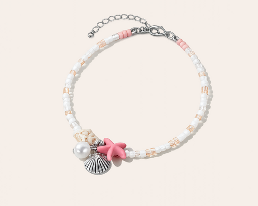 Beach-themed bracelet with silver charms